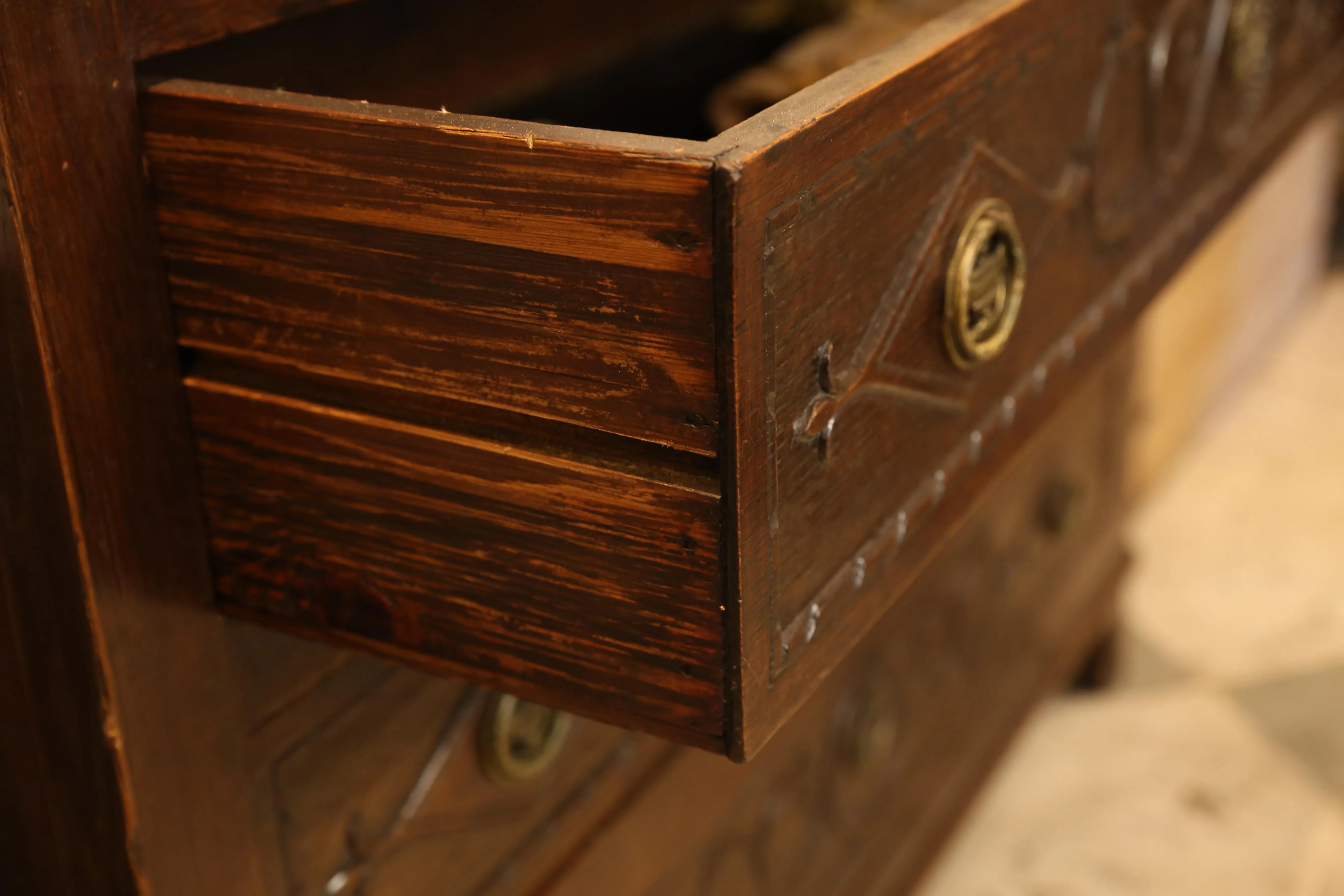 Antique French Commode with Intricately Decorated Drawer Fronts
