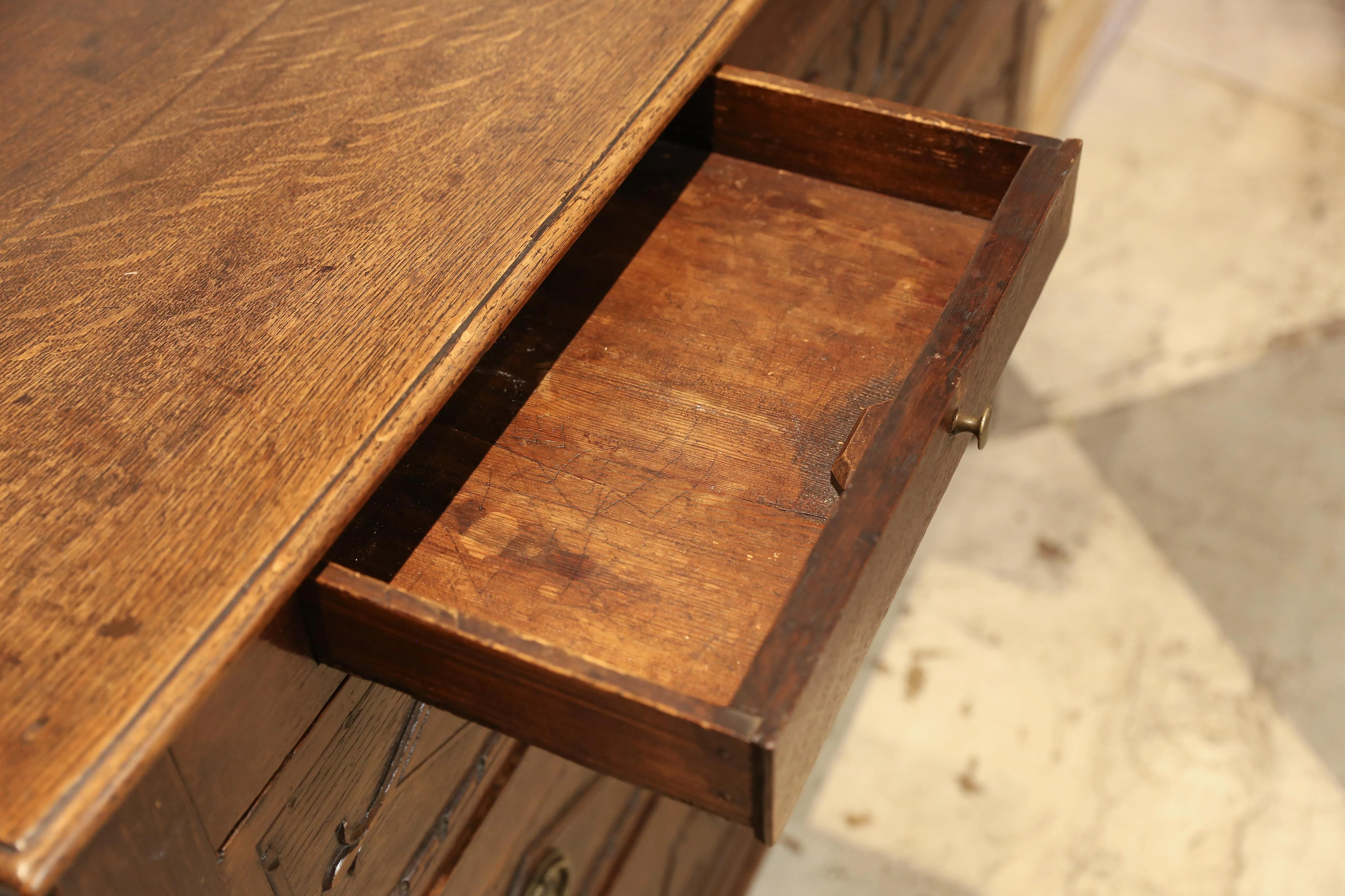 Antique French Commode with Intricately Decorated Drawer Fronts
