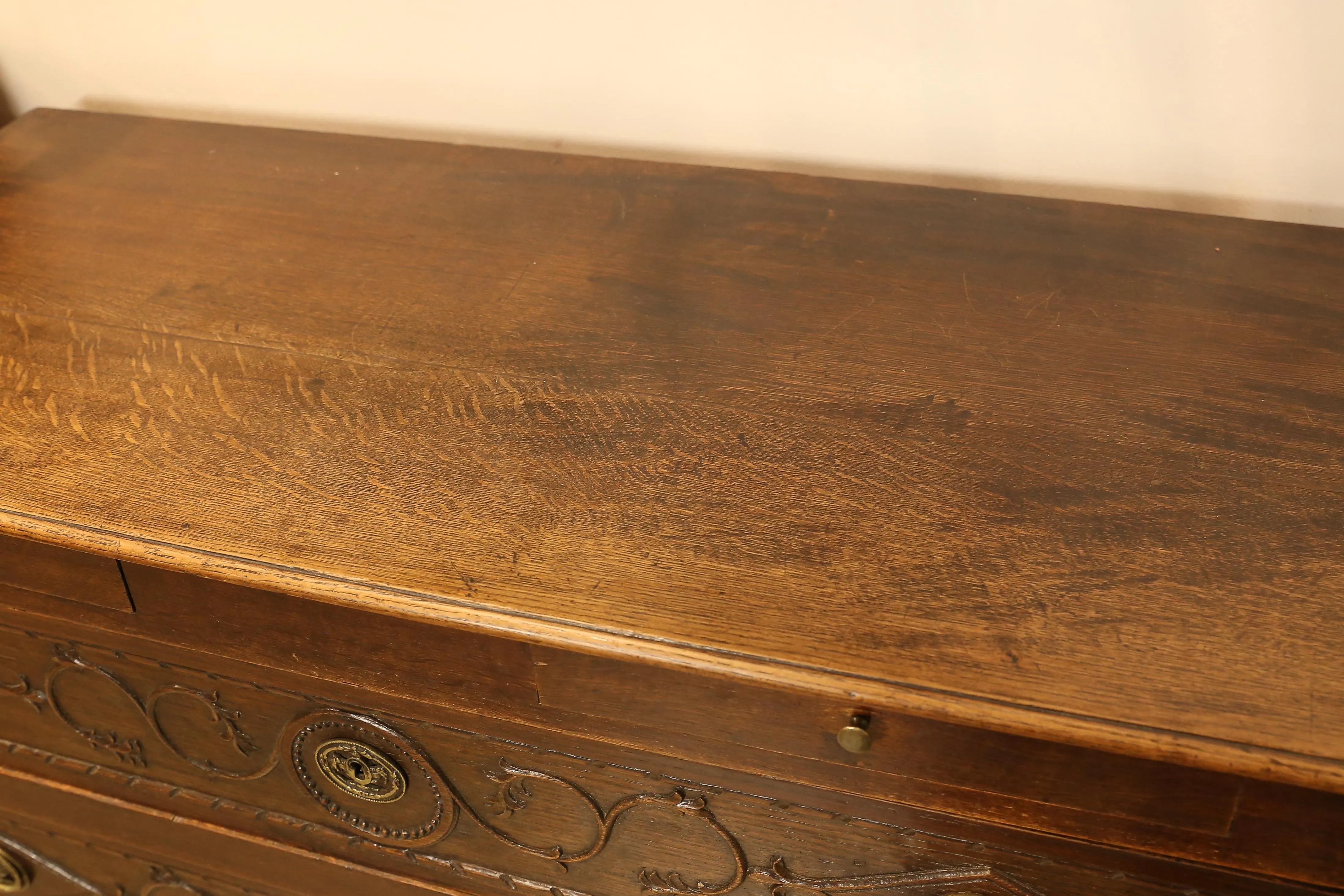 Antique French Commode with Intricately Decorated Drawer Fronts