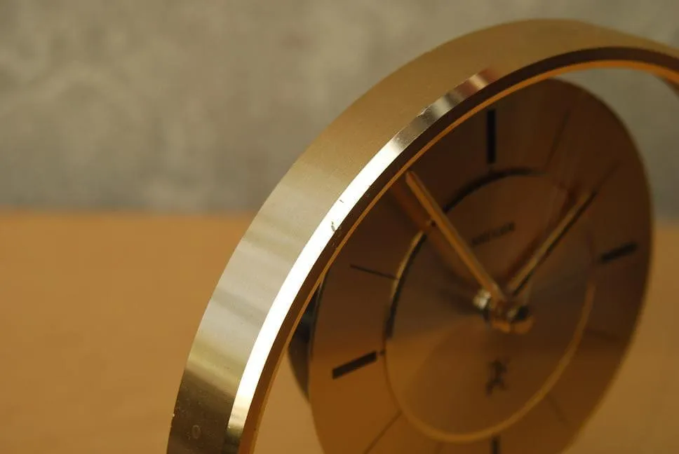 Kruger Floating Lucite Gold Round Mantel Clock