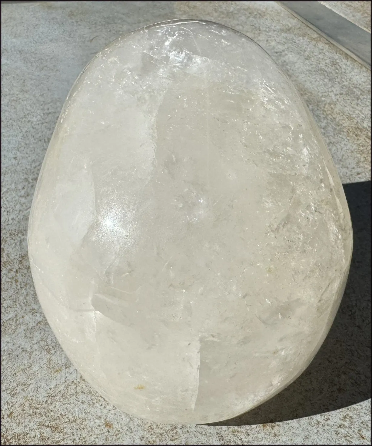 LifeSize Himalayan Quartz Crystal Skull with Crown Chakra Rainbows, Multi-Colored Hematite