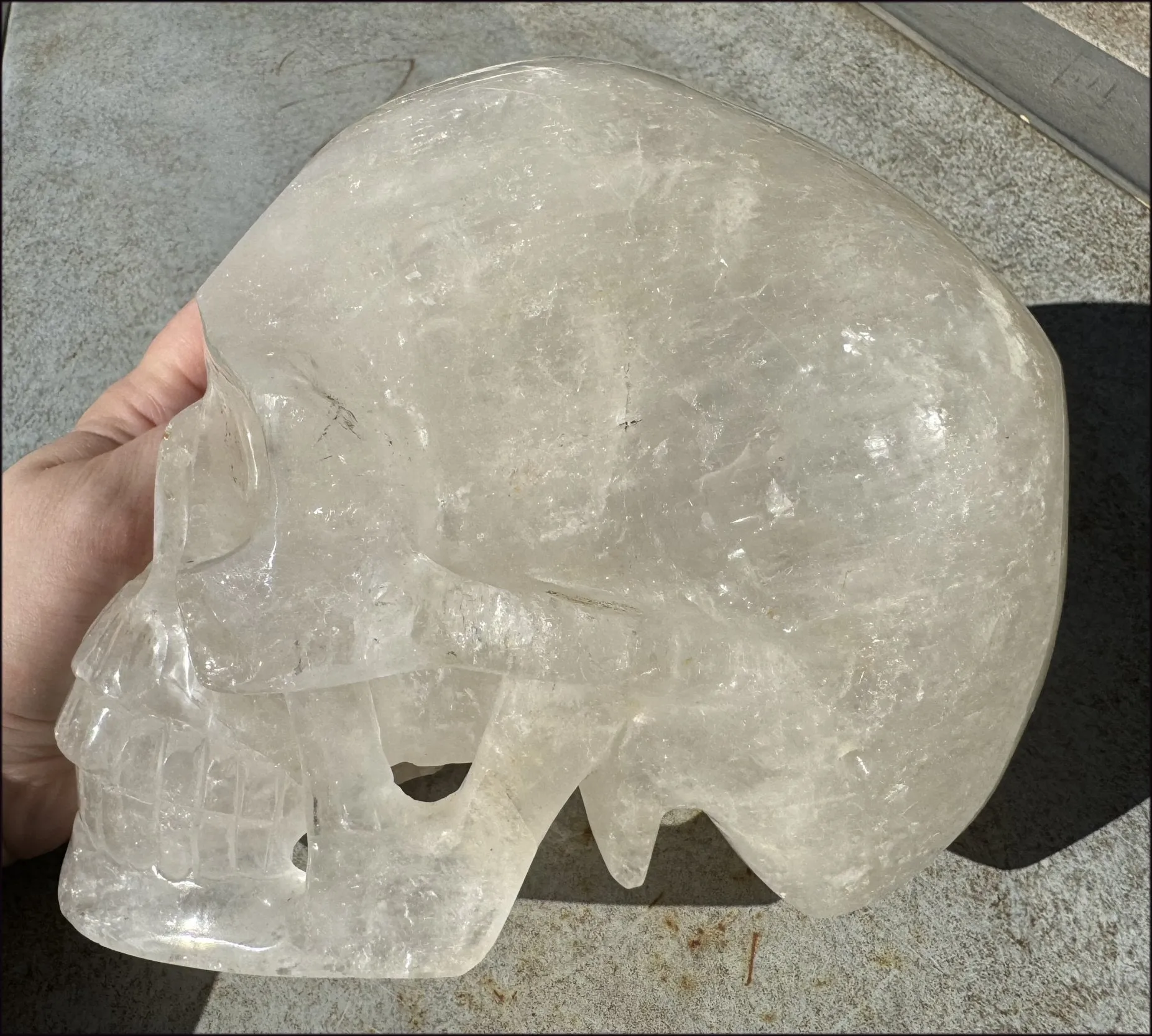 LifeSize Himalayan Quartz Crystal Skull with Crown Chakra Rainbows, Multi-Colored Hematite
