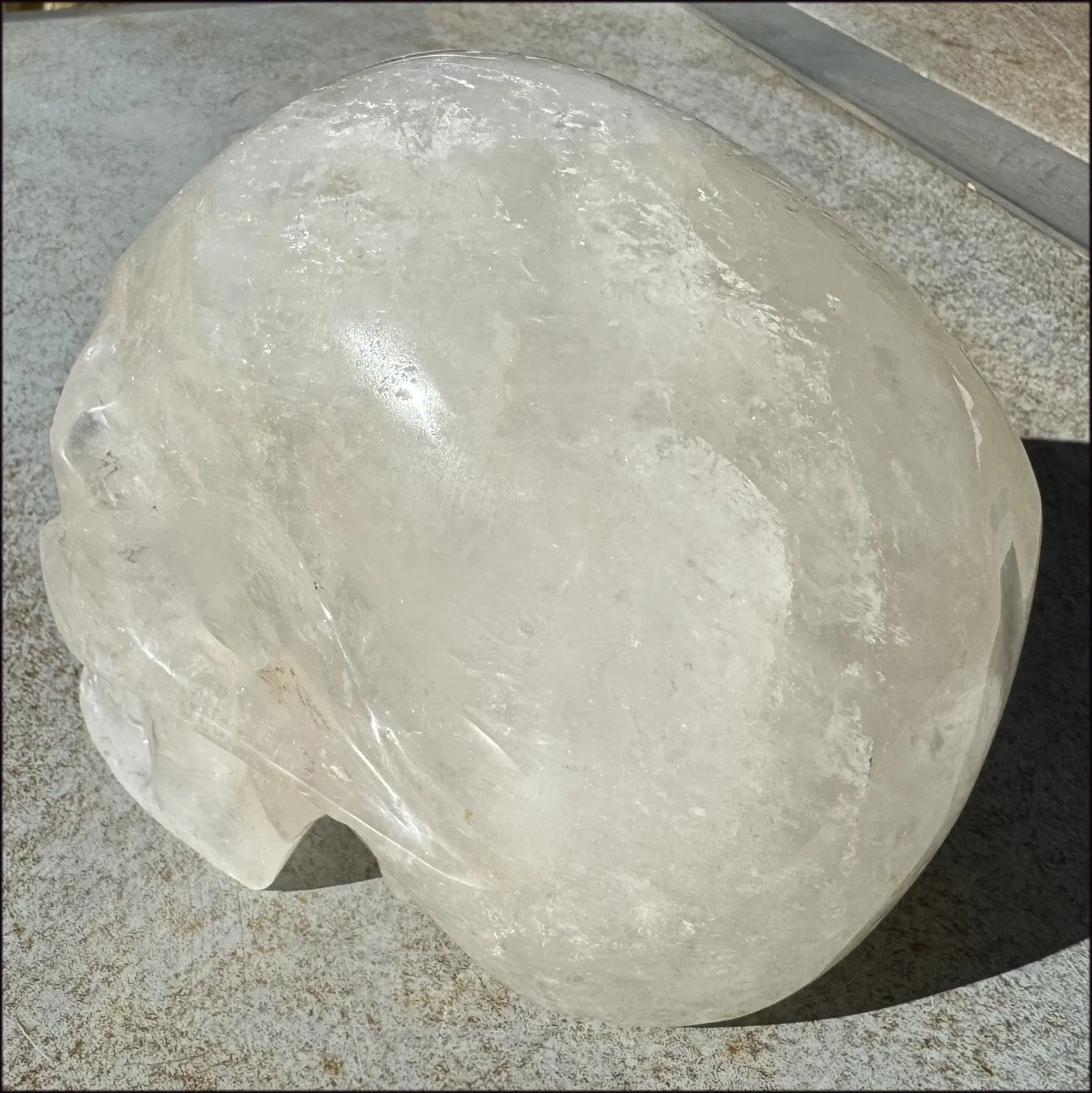 LifeSize Himalayan Quartz Crystal Skull with Crown Chakra Rainbows, Multi-Colored Hematite