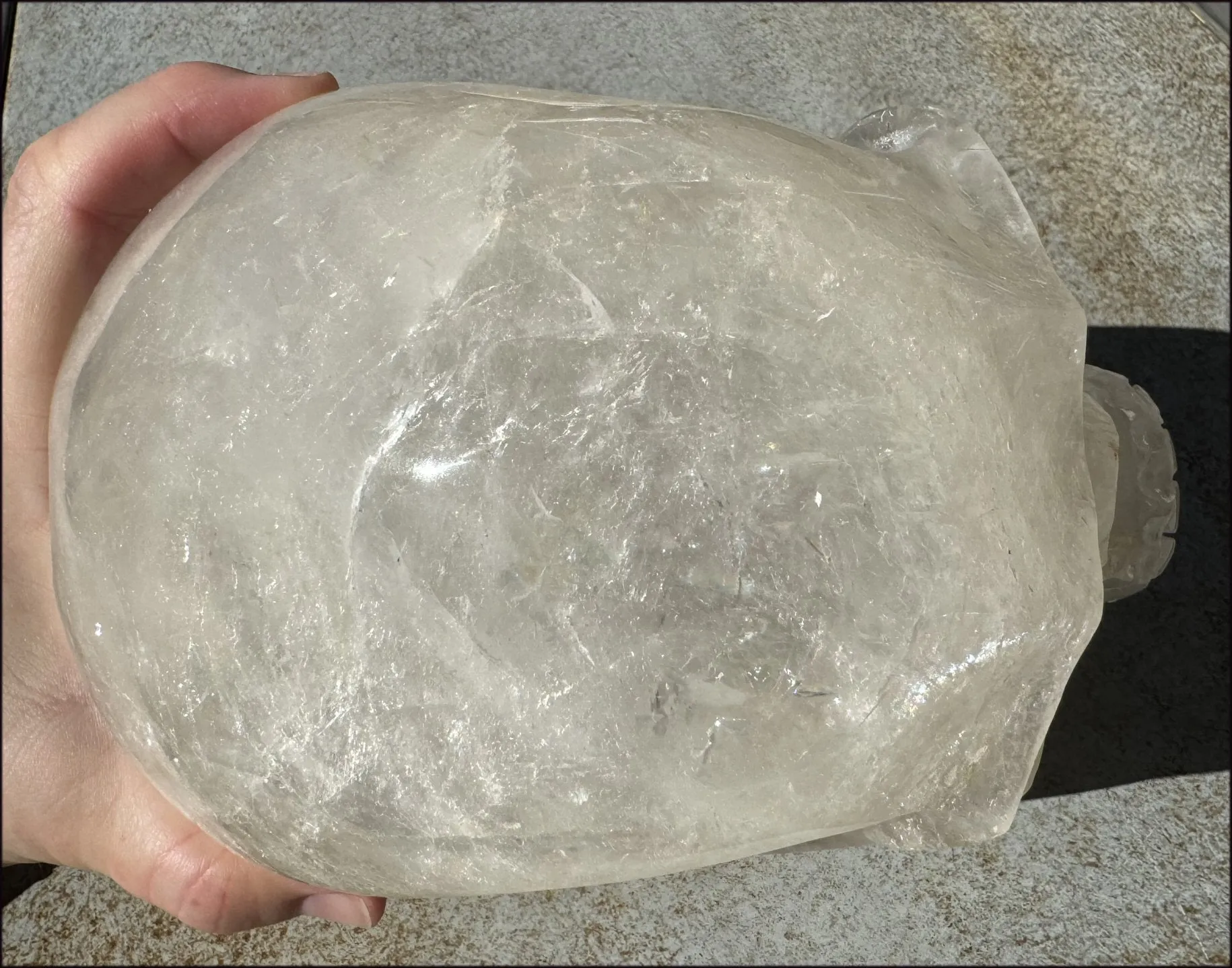 LifeSize Himalayan Quartz Crystal Skull with Crown Chakra Rainbows, Multi-Colored Hematite