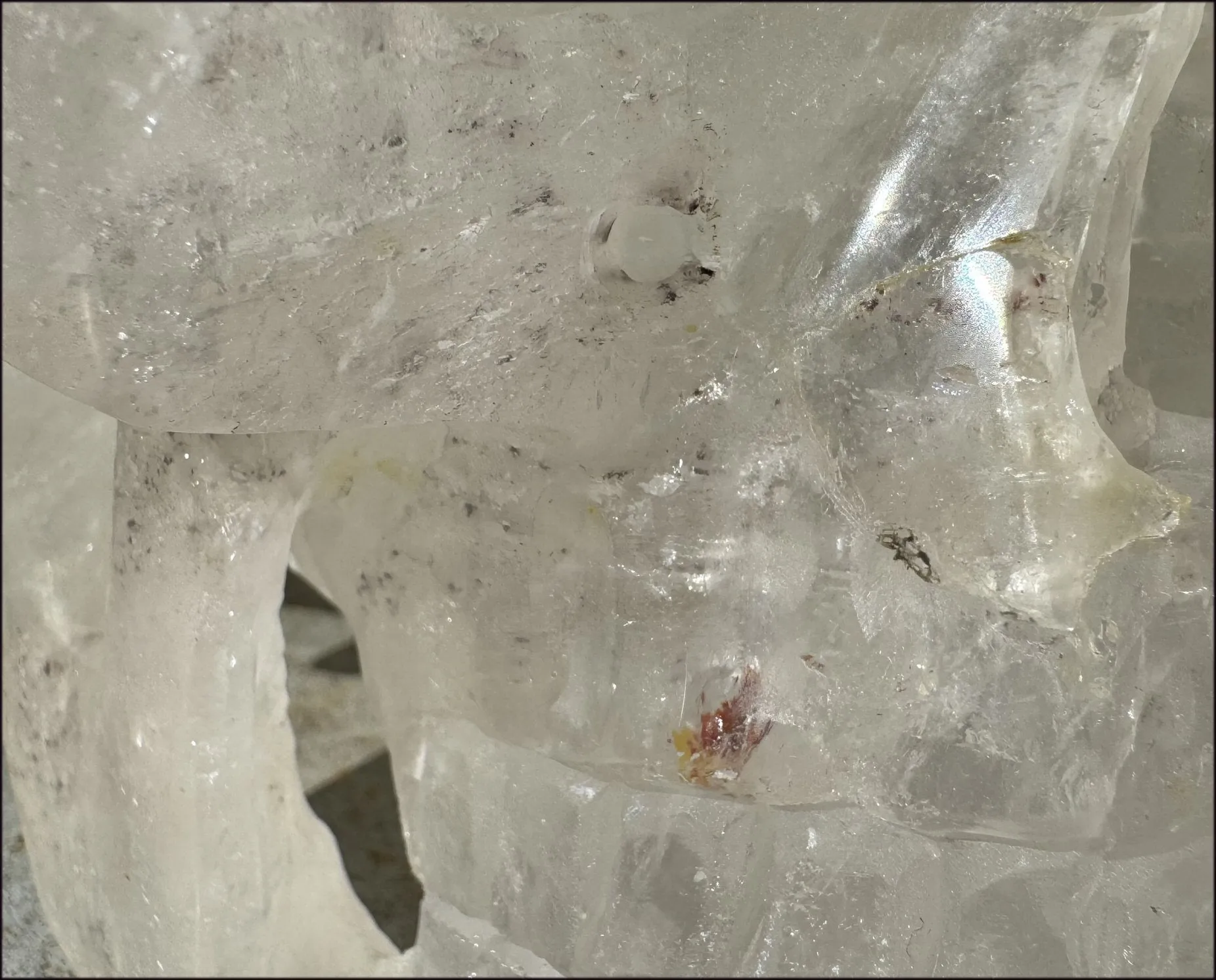 LifeSize Himalayan Quartz Crystal Skull with Crown Chakra Rainbows, Multi-Colored Hematite