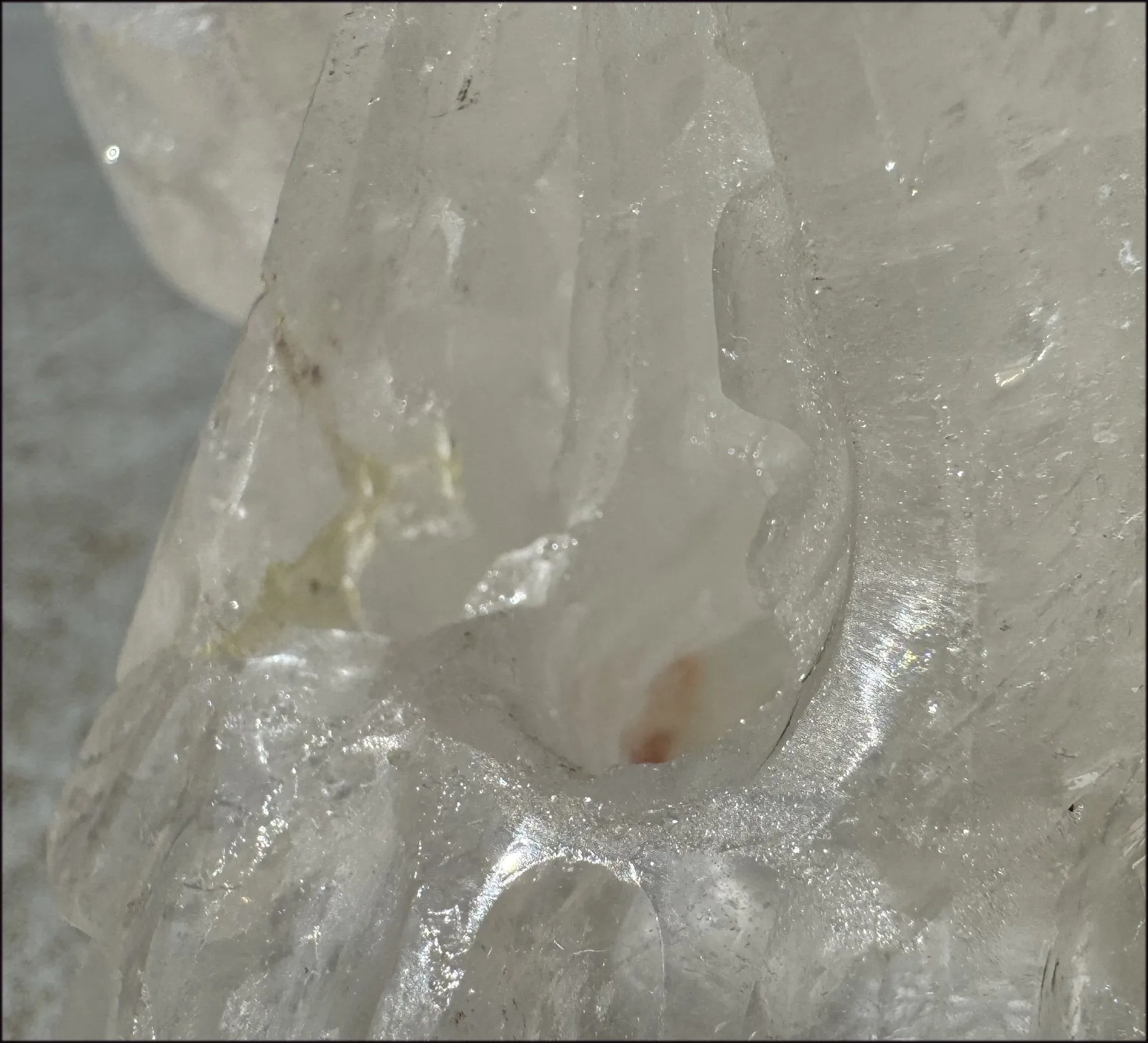LifeSize Himalayan Quartz Crystal Skull with Crown Chakra Rainbows, Multi-Colored Hematite