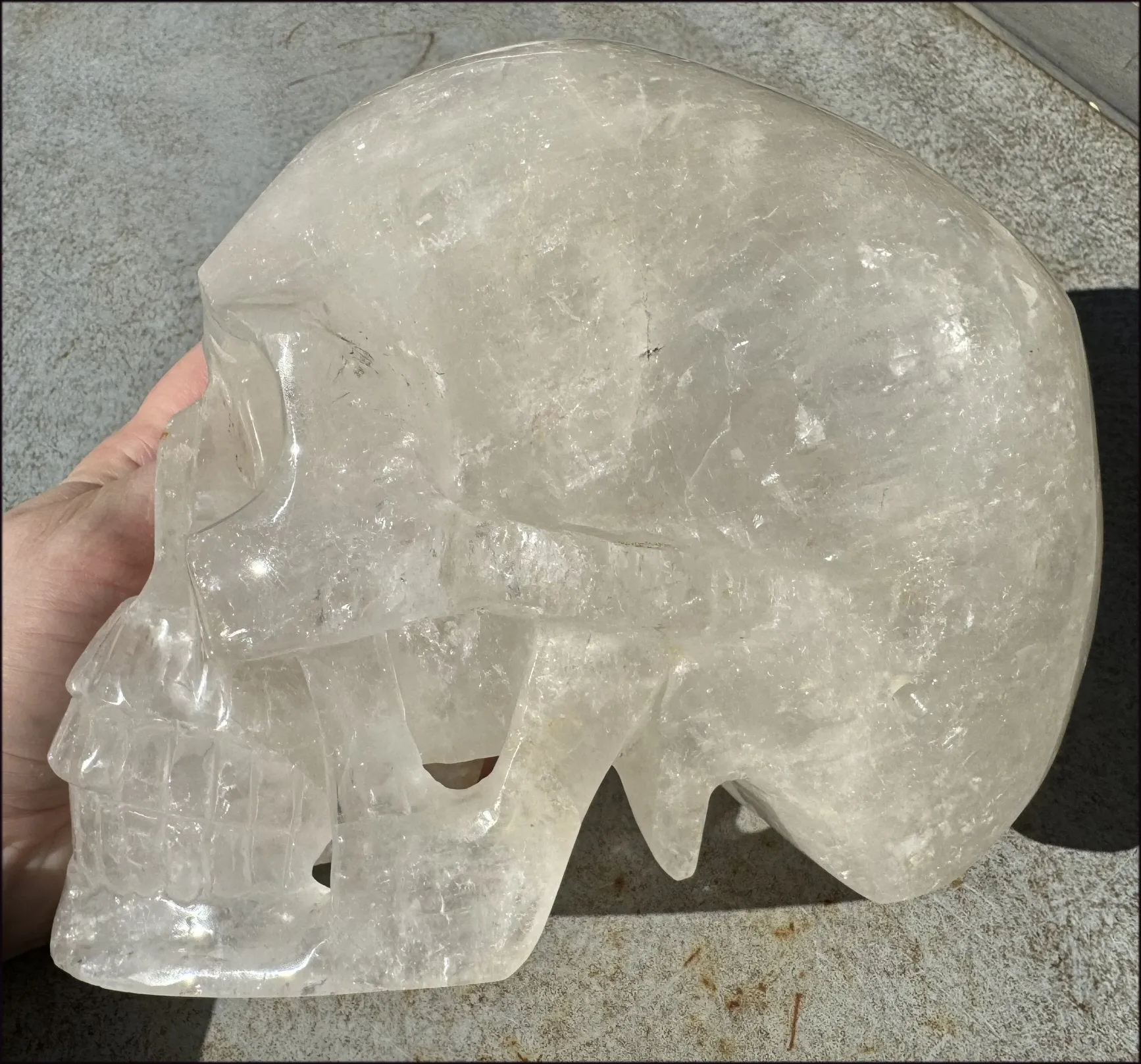 LifeSize Himalayan Quartz Crystal Skull with Crown Chakra Rainbows, Multi-Colored Hematite