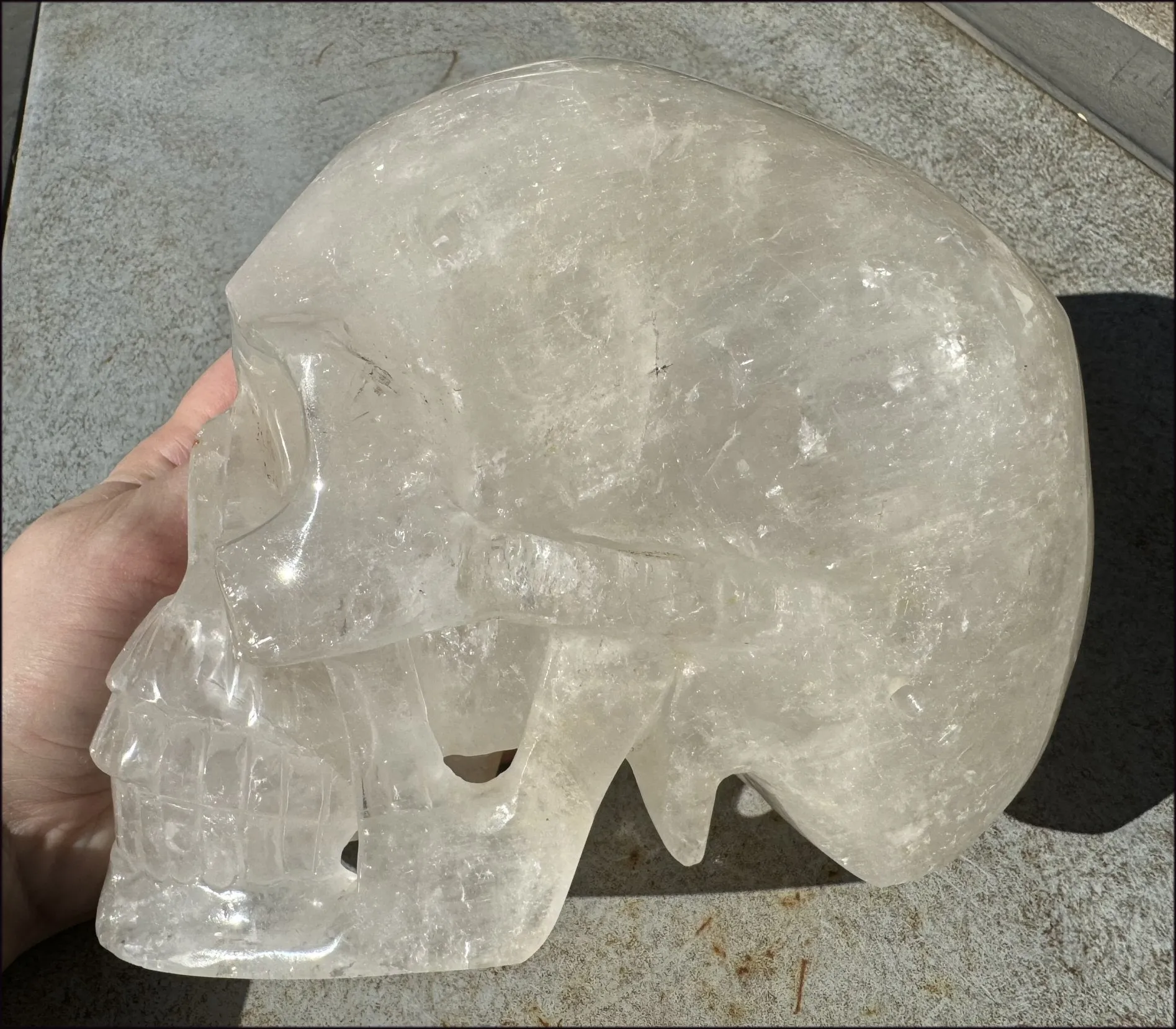 LifeSize Himalayan Quartz Crystal Skull with Crown Chakra Rainbows, Multi-Colored Hematite