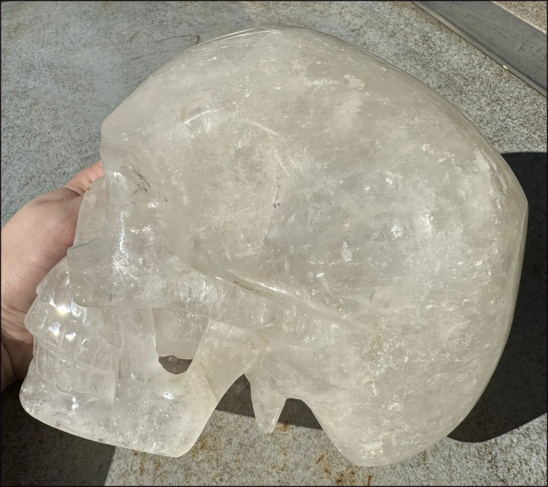 LifeSize Himalayan Quartz Crystal Skull with Crown Chakra Rainbows, Multi-Colored Hematite
