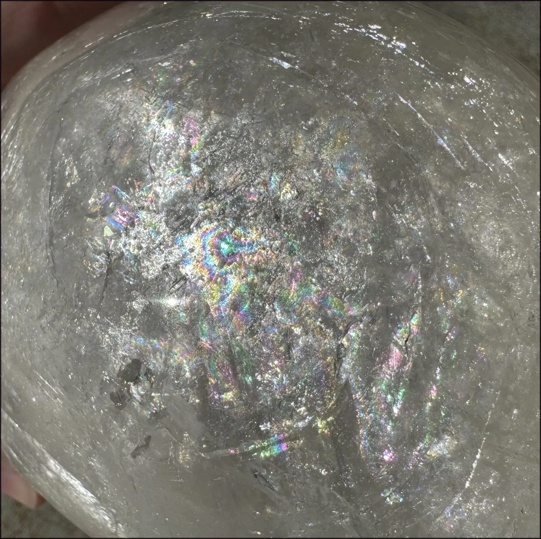 LifeSize Himalayan Quartz Crystal Skull with Crown Chakra Rainbows, Multi-Colored Hematite