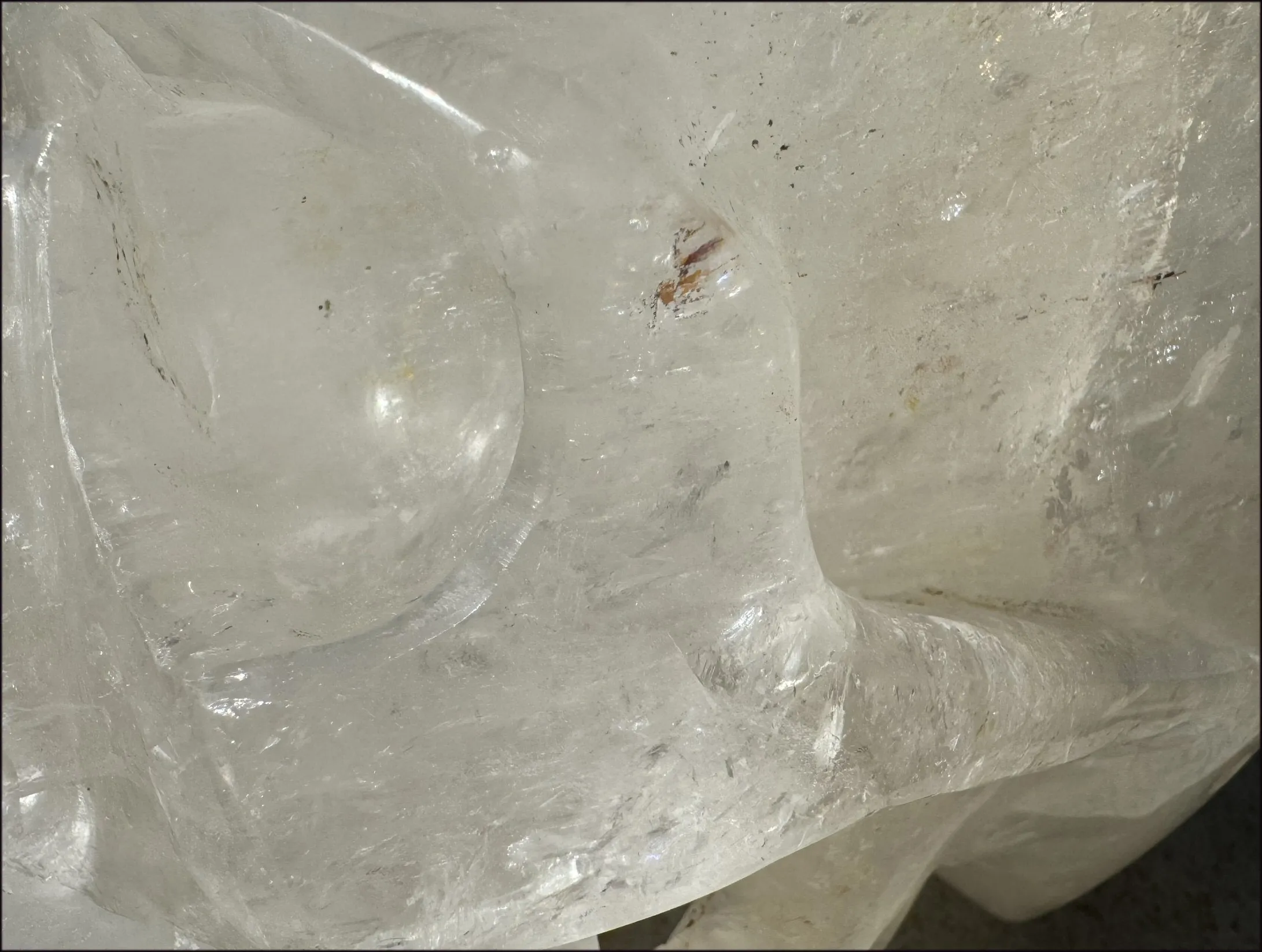 LifeSize Himalayan Quartz Crystal Skull with Crown Chakra Rainbows, Multi-Colored Hematite