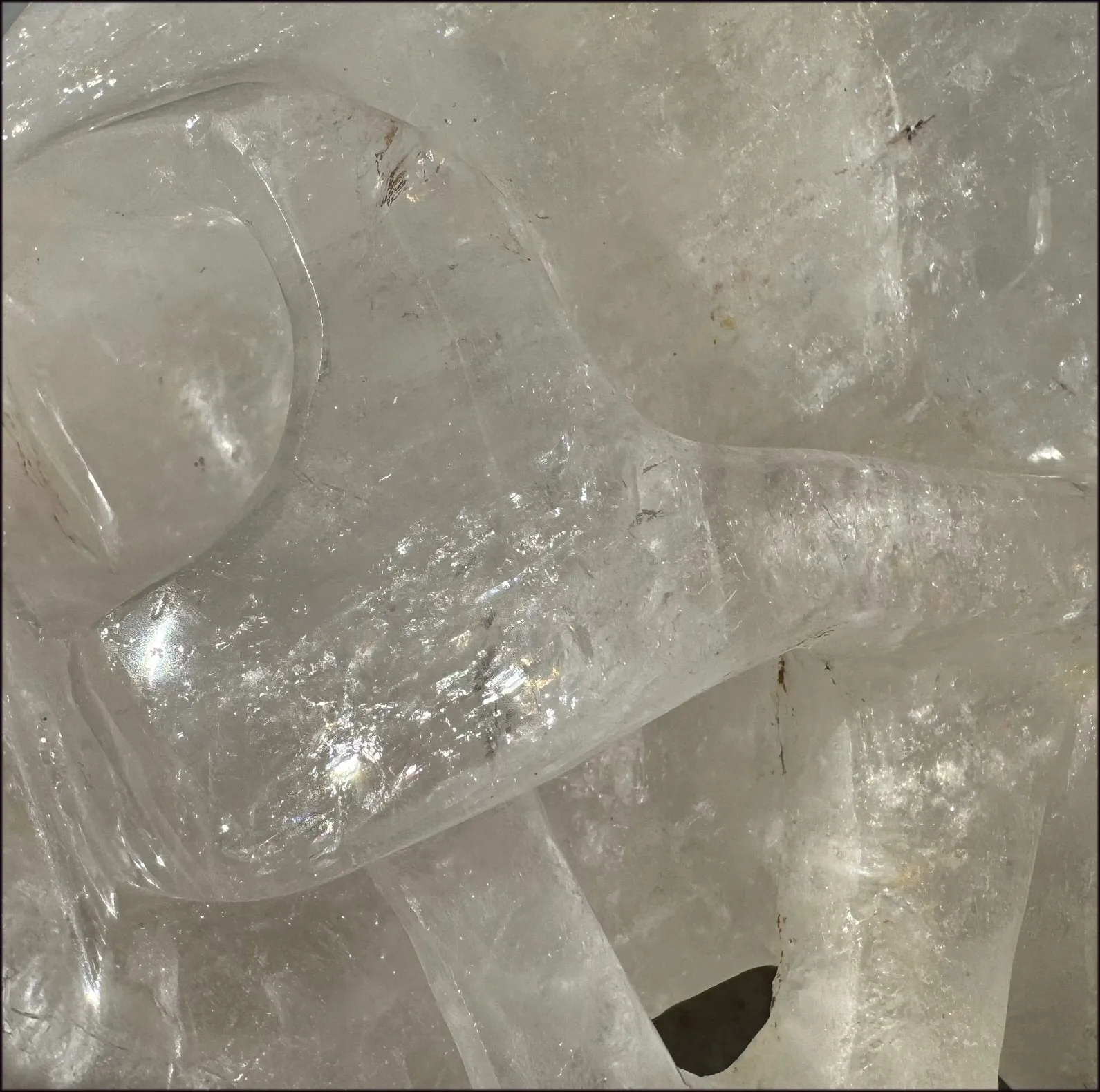 LifeSize Himalayan Quartz Crystal Skull with Crown Chakra Rainbows, Multi-Colored Hematite