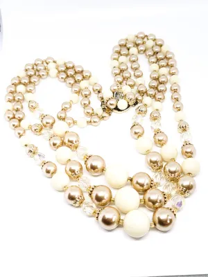 Shades of cream pearl Lucite Austrian crystal triple strand vintage necklace
