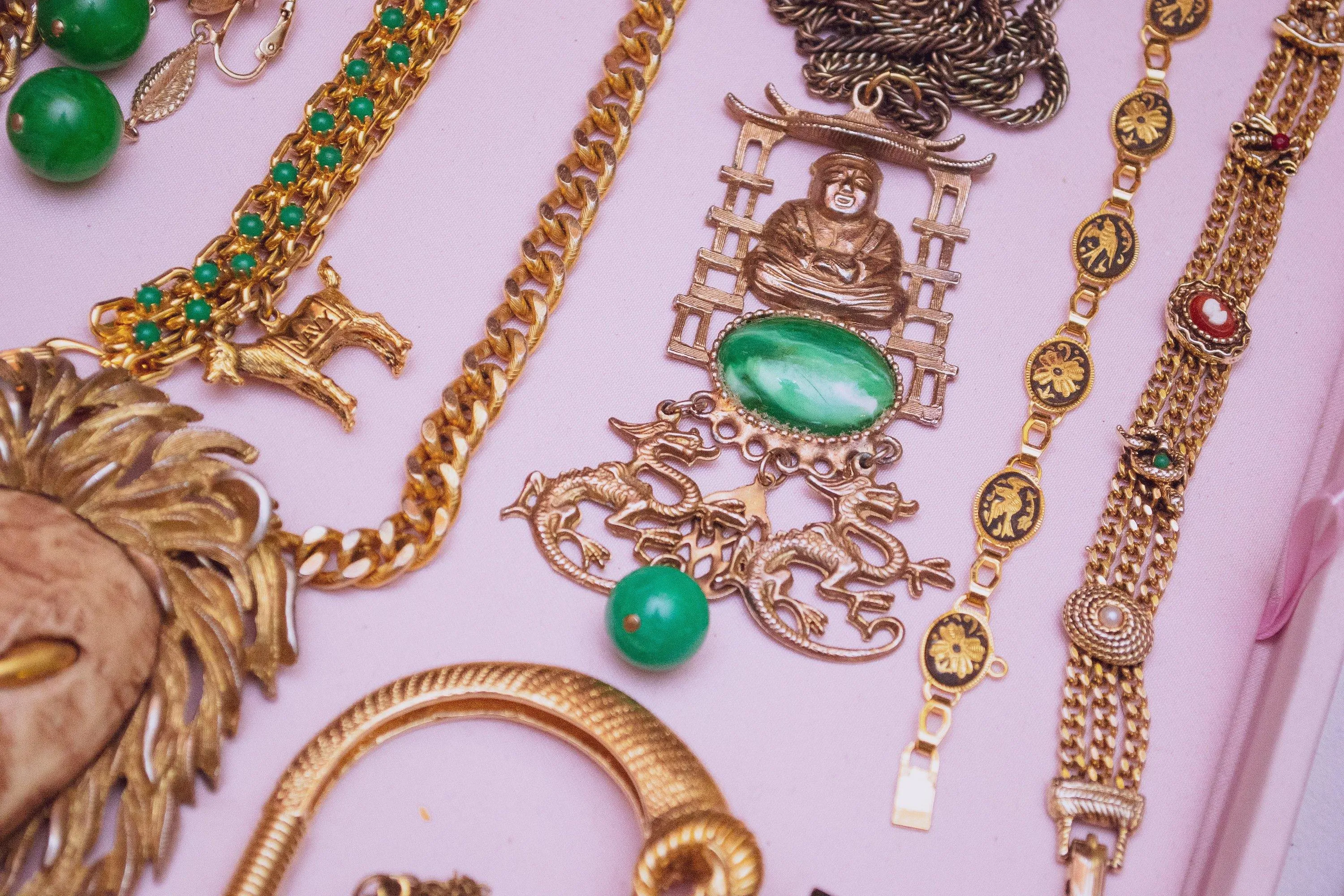 Vintage 1960s Gold Buddha and Jade Green Charm Statement Necklace